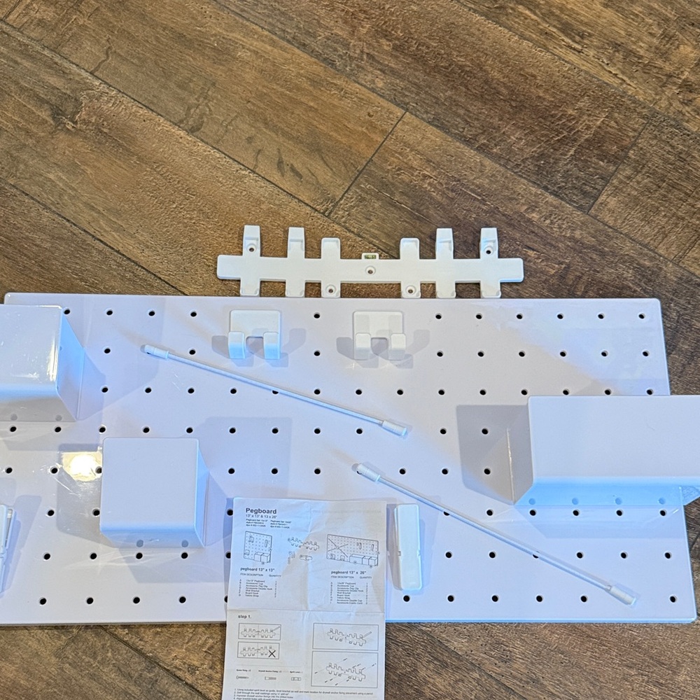 Pegboard 4 organization. Cups, clips, hooks & straps can be rearranged